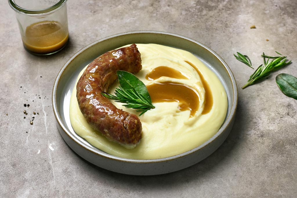 Saucisse de Toulouse purée et le jus maison d’Eric Frechon