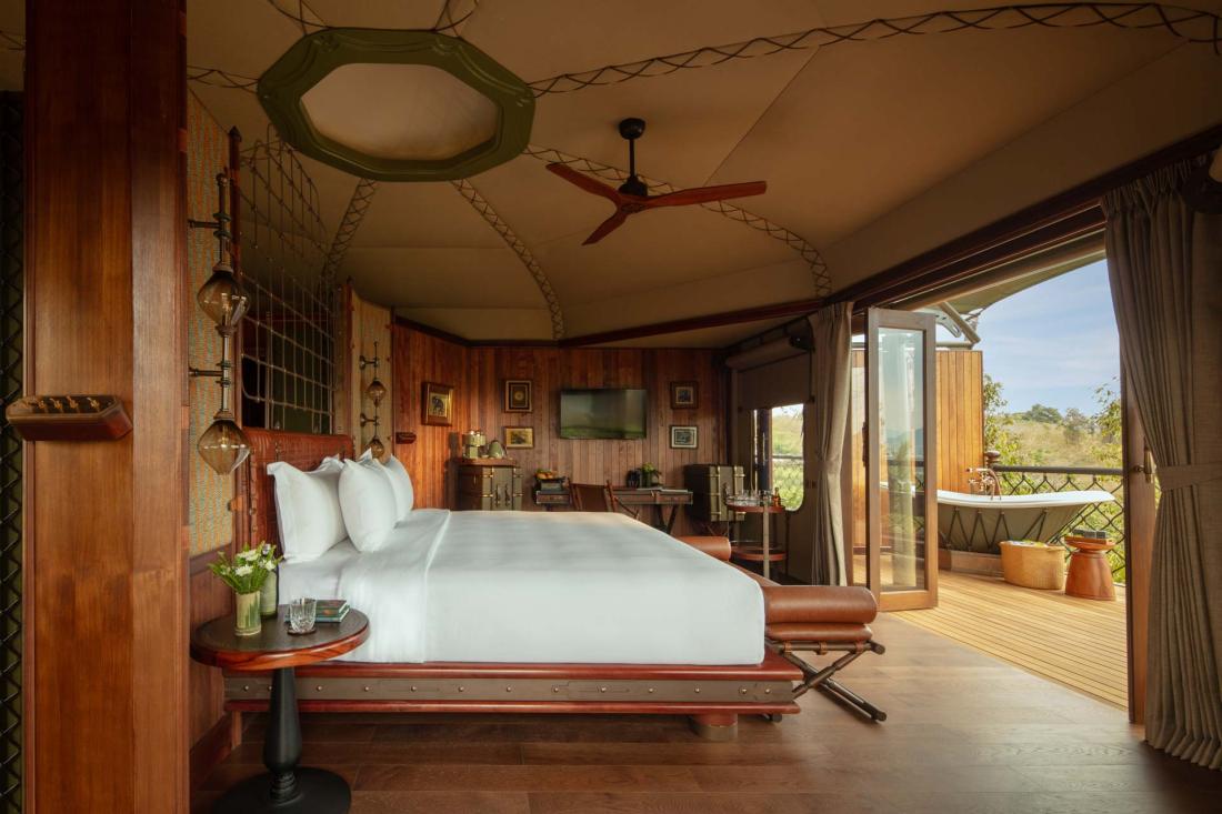 Depuis la chambre, une vue qui porte sur la nature environnante