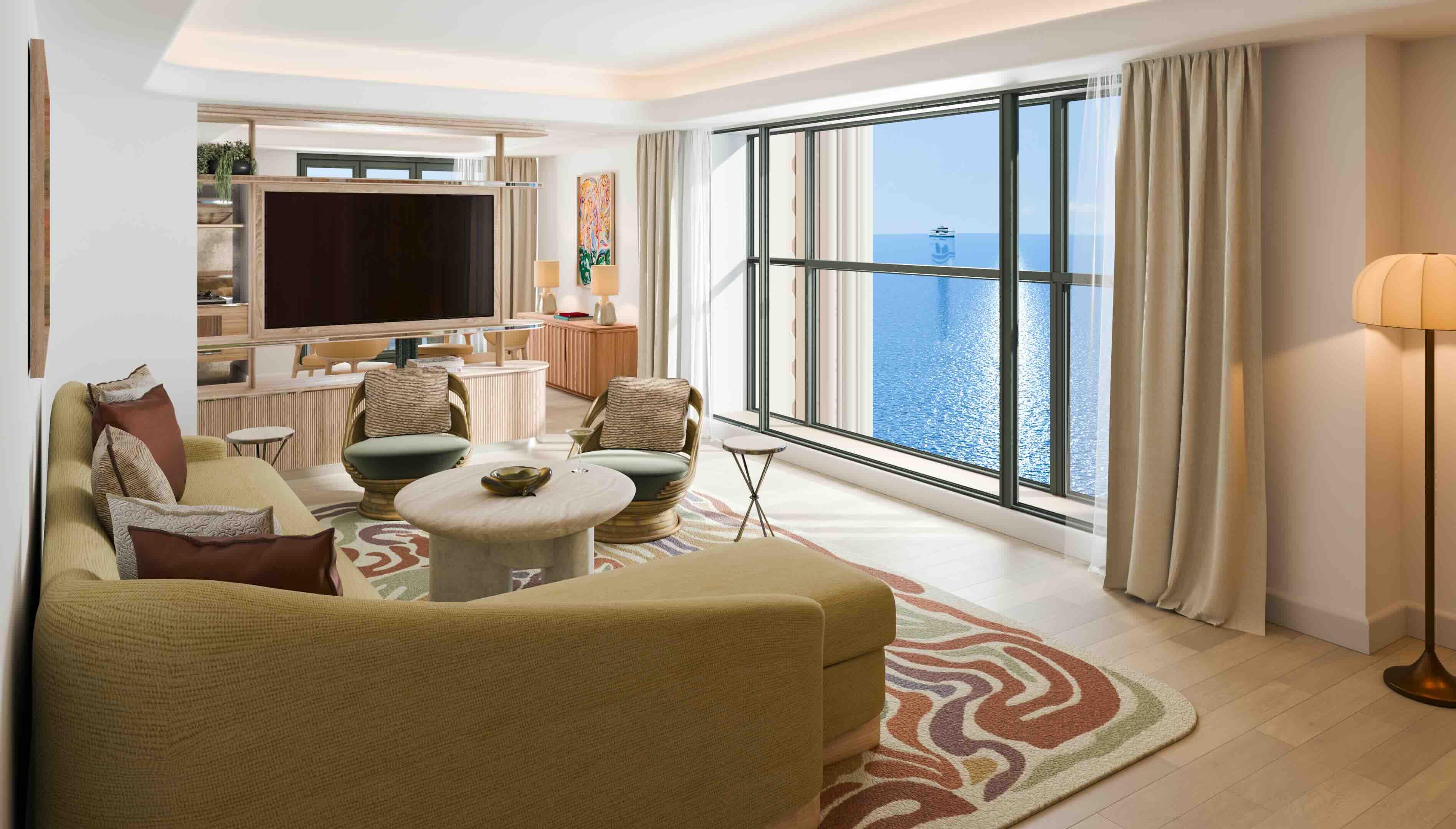 Le salon de la chambre prestige avec vue sur la mer © Palais de la Méditerranée
