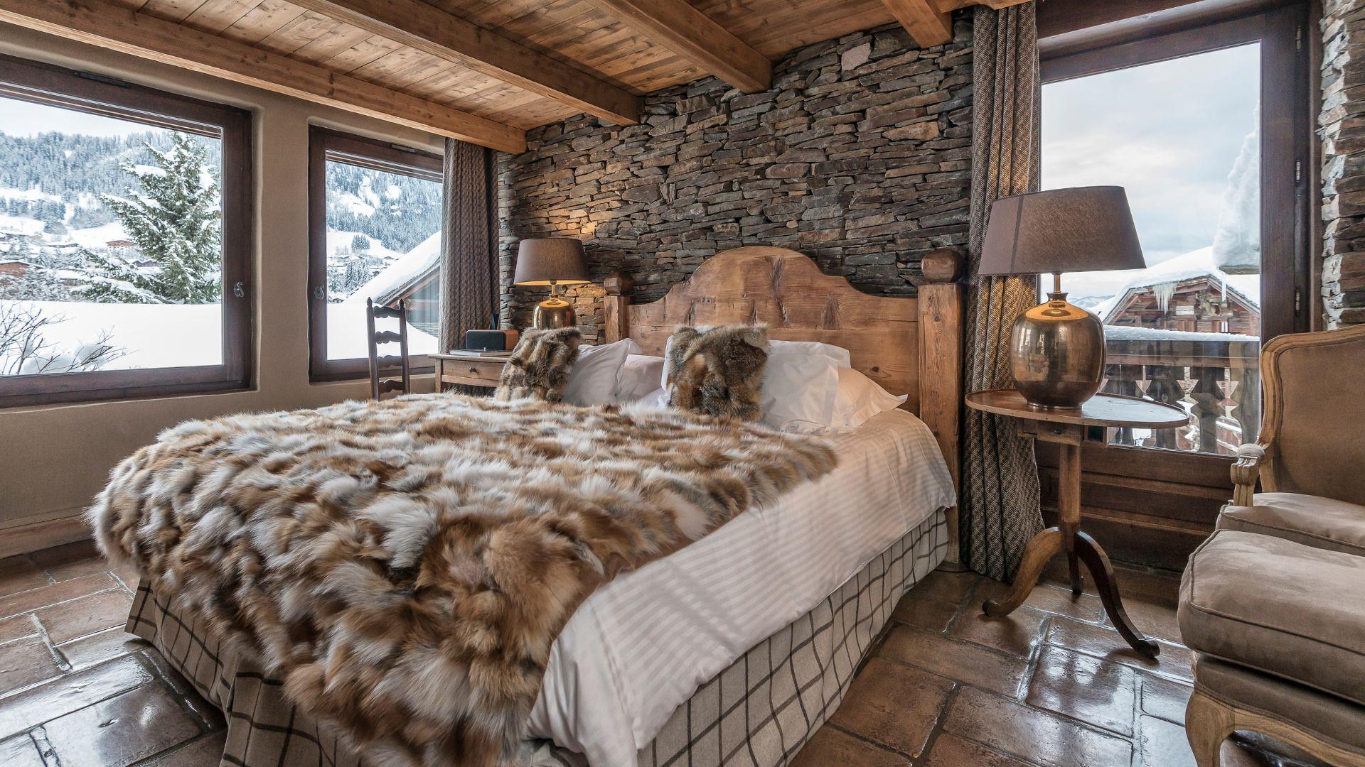 Une chambre dans le chalet © les Fermes de Marie 