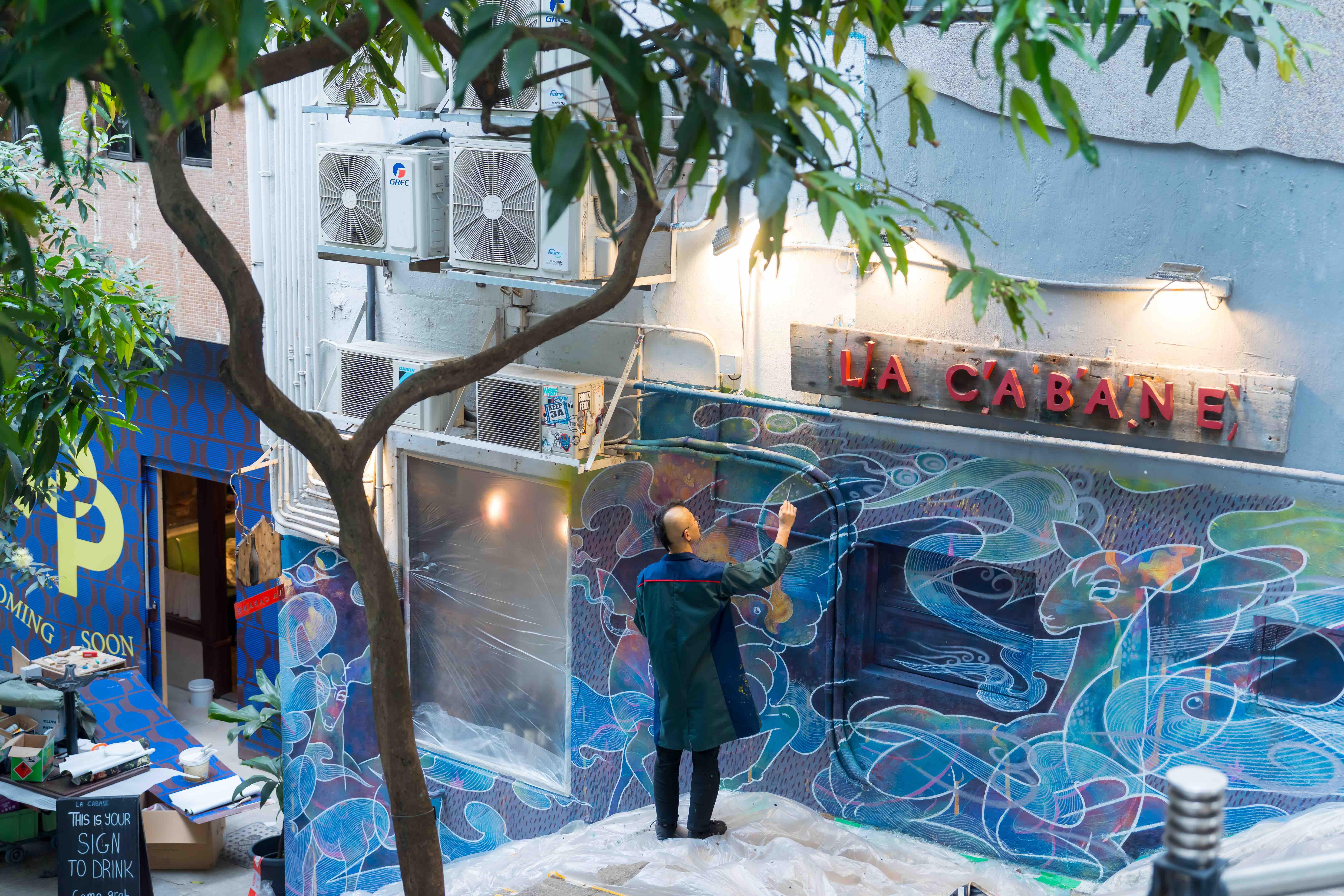 HKWalls, artiste en plein travail © Hong Kong Tourism Board