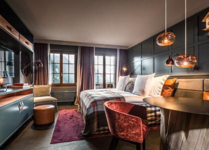 Le HUUS Hotel Gstaad, refuge design dans la prestigieuse station suisse