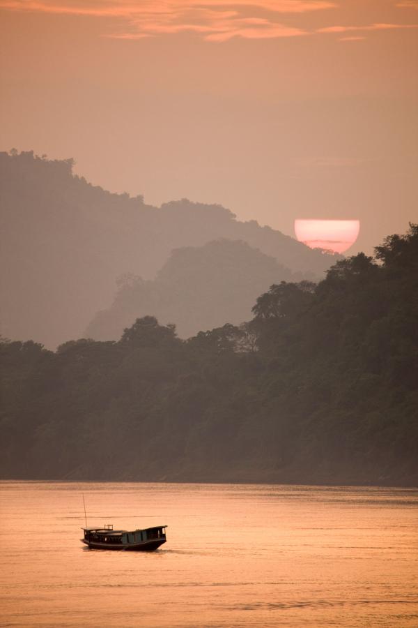 Croisière sur le Mékong au coucher de soleil © Aman