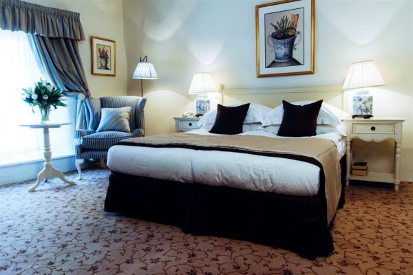 Dans les chambres Deluxe Double, confort et tradition | © Hotel Schlössle