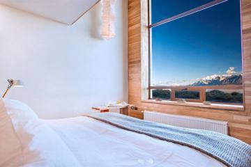 Lit avec vue, dans l'une des trois suites de l'hôtel | © Tierra Patagonia